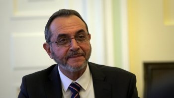 Gość u Ministra przy stole